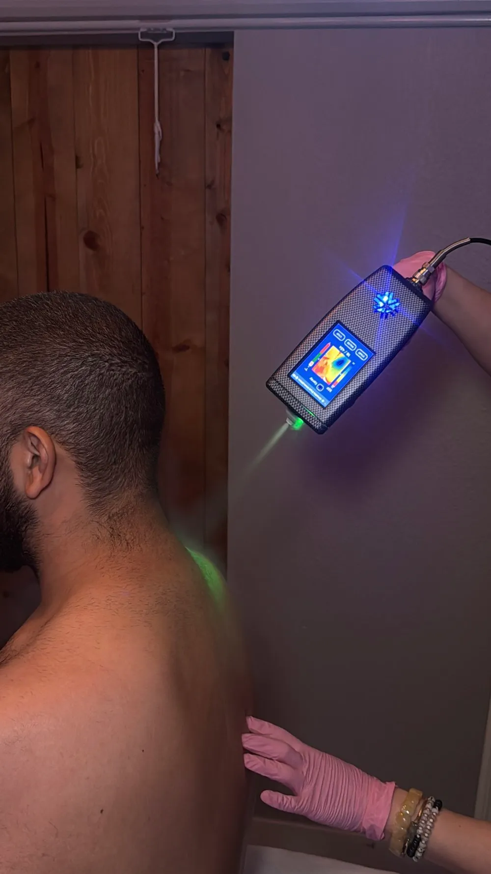 XR ISO treating a client's shoulder and neck after training